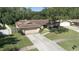 Lovely single-story home with a neatly kept lawn and two car garage in a quiet neighborhood at 2532 Sweetgum W Way, Clearwater, FL 33761