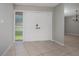 A spacious foyer with tile flooring, double doors and natural light at 2532 Sweetgum W Way, Clearwater, FL 33761