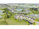 Beautiful aerial view of a Primary planned community surrounding a lake at 31105 Mango Fade Way, San Antonio, FL 33576