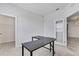 This bedroom features an adjacent closet and glass-paned door at 31105 Mango Fade Way, San Antonio, FL 33576