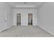 Large bedroom featuring closets and a bathroom at 31105 Mango Fade Way, San Antonio, FL 33576