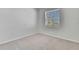 Cozy bedroom with a window bringing in light at 31105 Mango Fade Way, San Antonio, FL 33576