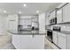 A large kitchen island is the focal point of this spacious kitchen at 31105 Mango Fade Way, San Antonio, FL 33576