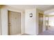 Condo entryway showing the unit door and outdoor lighting at 3232 Lake Pine E Way # A2, Tarpon Springs, FL 34688