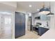 Modern kitchen with stainless steel appliances and white subway tile backsplash at 3232 Lake Pine E Way # A2, Tarpon Springs, FL 34688