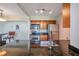 Bright kitchen with stainless steel appliances, granite counters, and wood cabinetry at 3301 Haviland Ct # 301, Palm Harbor, FL 34684