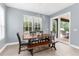 Dining area with a view to the outdoor patio at 3500 Ballastone Dr, Land O Lakes, FL 34638