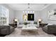 Bright living room with modern decor, stylish furniture, and abundant natural light at 3500 Ballastone Dr, Land O Lakes, FL 34638