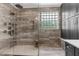 This is an upscale shower with a bench, rainfall showerhead and body jets at 3500 Ballastone Dr, Land O Lakes, FL 34638