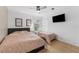 Cozy bedroom featuring twin beds, natural light, and neutral decor, perfect for children or guests at 3509 Country Creek Ln, Valrico, FL 33596