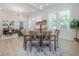 Beautiful living space with an open floor plan with dining room, living room, and modern furniture at 3811 N Arlington Ave, Tampa, FL 33603