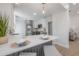 Kitchen features white countertops, gray lower cabinets, and stainless steel appliances at 3811 N Arlington Ave, Tampa, FL 33603