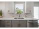 Bright kitchen featuring modern countertops, stainless appliances, and stylish cabinets at 3811 N Arlington Ave, Tampa, FL 33603