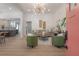 Bright and airy living room featuring an open floor plan, light wood flooring, and contemporary furnishings at 3811 N Arlington Ave, Tampa, FL 33603