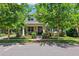 Attractive two-story home with well-kept lawn, a welcoming porch, and charming curb appeal at 3833 Villamore Ln, Odessa, FL 33556