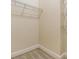 Walk-in closet with shelving and carpeted floor at 3918 Silverlake Way, Wesley Chapel, FL 33544