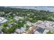Stunning aerial view of property and neighborhood with lush greenery and waterfront views at 411 Locklie St, Dunedin, FL 34698