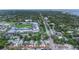 Discover this home near the baseball field, lush trees, and walkable neighborhood streets at 411 Locklie St, Dunedin, FL 34698