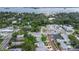 Discover this home nestled among lush greenery, neighborhood streets, and glimpses of the bay at 411 Locklie St, Dunedin, FL 34698