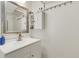 Clean bathroom features a single vanity, a large mirror, and ample storage space at 4322 Fincastle Ct, Tampa, FL 33624