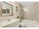 Updated bathroom featuring mosaic tile and modern fixtures at 4322 Fincastle Ct, Tampa, FL 33624