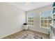 Bedroom features natural light, laminate floors and a neutral wall at 4322 Fincastle Ct, Tampa, FL 33624