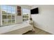 Bedroom featuring wood floors, neutral walls, and lots of natural light at 4322 Fincastle Ct, Tampa, FL 33624