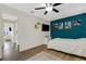 Inviting bedroom with hardwood floors, a ceiling fan, and recessed lights at 4322 Fincastle Ct, Tampa, FL 33624