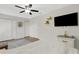 Spacious bedroom with hardwood floors, closets, and contemporary decor at 4322 Fincastle Ct, Tampa, FL 33624