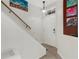 Welcoming entryway featuring a white front door, tile flooring, and wall art at 4322 Fincastle Ct, Tampa, FL 33624