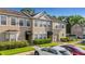 Stylish townhome with a private garage, manicured landscaping, and convenient parking spaces at 4322 Fincastle Ct, Tampa, FL 33624