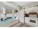 Bright kitchen area with an adjacent breakfast nook featuring a bay window and modern appliances at 4322 Fincastle Ct, Tampa, FL 33624