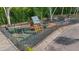Fenced playground featuring swings, slides, and a playhouse for outdoor fun at 4322 Fincastle Ct, Tampa, FL 33624