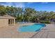 Community pool with plenty of lounge chairs and pool house at 4322 Fincastle Ct, Tampa, FL 33624