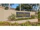 Close-up of Trafalgar Square sign, showing manicured landscaping and community branding at 4322 Fincastle Ct, Tampa, FL 33624