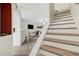 Bright staircase with hardwood treads and white risers leading to the next floor at 4322 Fincastle Ct, Tampa, FL 33624