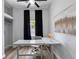 Home office featuring a modern white desk, chair and sleek decor at 4401 S Trask St, Tampa, FL 33611