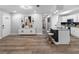 Spacious floor plan shows living, dining and updated kitchen with seating and modern finishes at 4401 S Trask St, Tampa, FL 33611