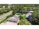 Aerial view of a community park, clubhouse, and playground for residents at 4735 Red Pine Way, Wesley Chapel, FL 33545
