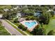 Community amenities including a swimming pool, tennis court, and playground at 4735 Red Pine Way, Wesley Chapel, FL 33545