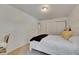 Bedroom features white walls, neutral carpet, and a queen-sized bed at 4735 Red Pine Way, Wesley Chapel, FL 33545