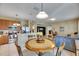 Open kitchen and dining area, seamlessly connects to the living space for easy entertaining and Gathering time at 4735 Red Pine Way, Wesley Chapel, FL 33545