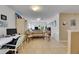 Spacious living area with tile flooring and large windows offering abundant natural light at 4735 Red Pine Way, Wesley Chapel, FL 33545