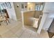 View of the carpeted stairs leading down to the lower level of the home at 4735 Red Pine Way, Wesley Chapel, FL 33545