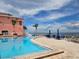 Scenic outdoor pool area with views of the ocean and comfortable lounge seating at 4985 Cobia Se Dr # A, St Petersburg, FL 33705