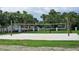 Outdoor volleyball court perfect for beach volleyball games with net, sandy area, and grass at 4985 Cobia Se Dr # A, St Petersburg, FL 33705
