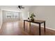 Open living room featuring hardwood floors, neutral paint, and lots of natural light at 502 Cara Ct # 502, Largo, FL 33771