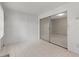 Open sunroom with tile floor and sliding glass doors for flexible living space at 502 Cara Ct # 502, Largo, FL 33771