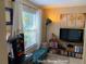 Comfortable bonus room setup with a view, modern décor and a well-lit atmosphere at 5139 Corvette Dr, Tampa, FL 33624
