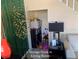 Cozy living room area featuring a storage nook, contemporary lamp and stylish decor, with a decorative lighted tree at 5139 Corvette Dr, Tampa, FL 33624